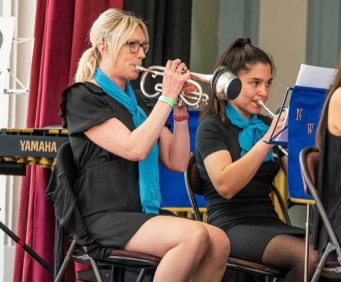 Two players performing on stage