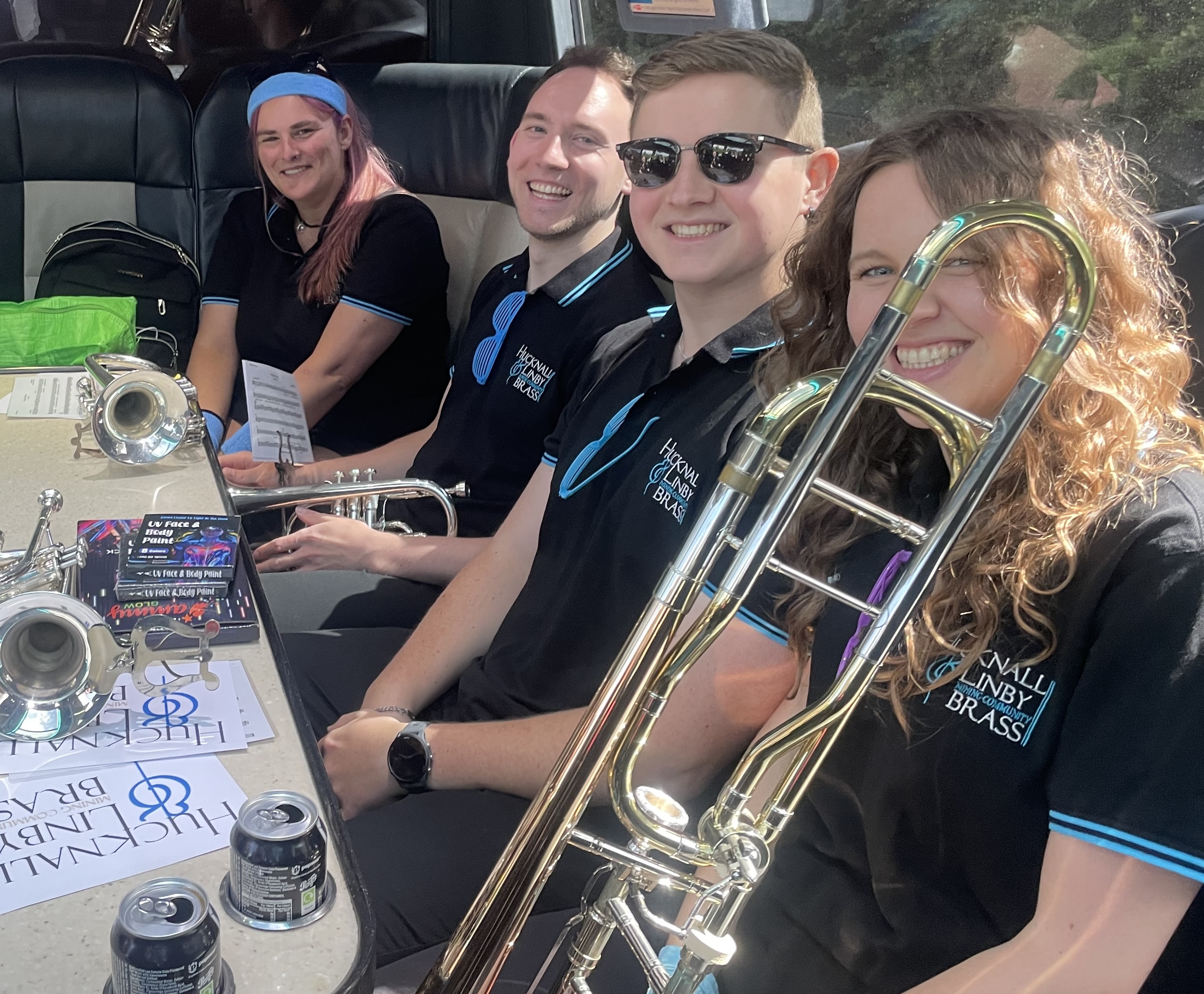 Band members on the coach